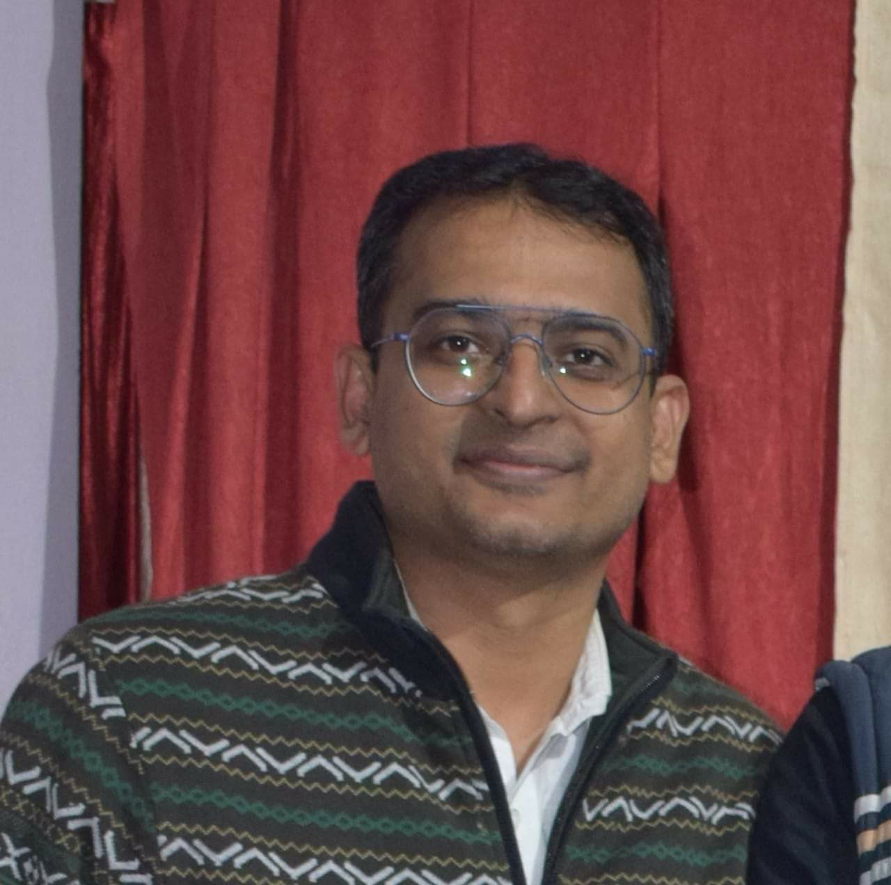 Dr. Anand Tiwari