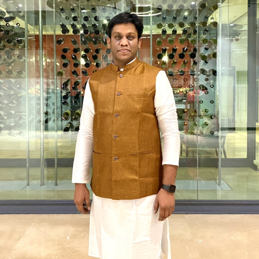 JOHN MANOJ PETETI