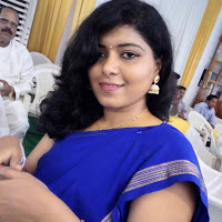 Rekha B